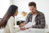 two people reviewing documents